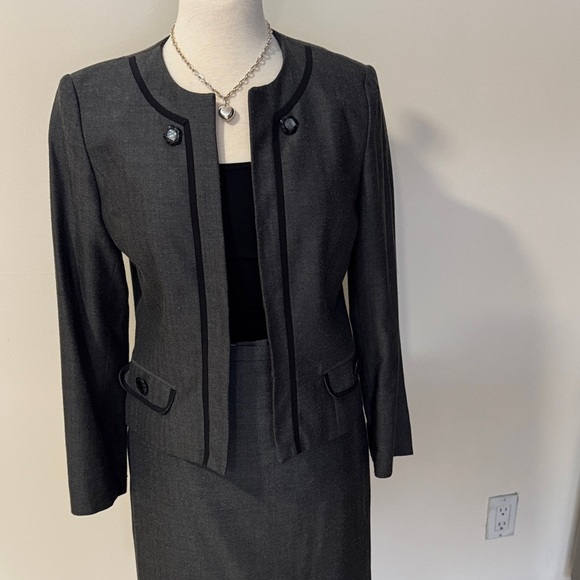 Rina Rossi gray skirt suit.